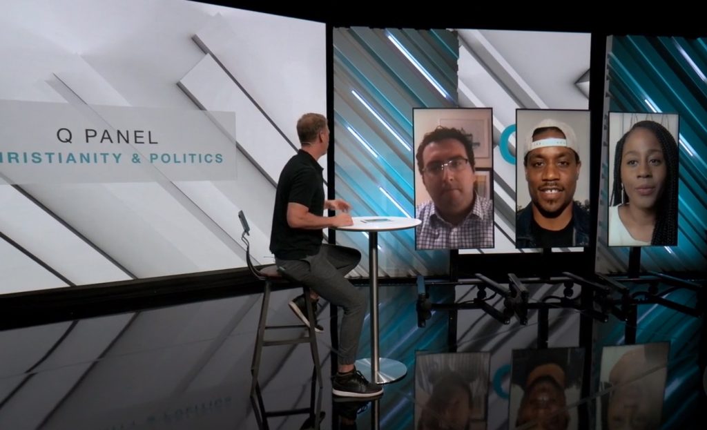 Person live streaming an interview with a panel of guests 

